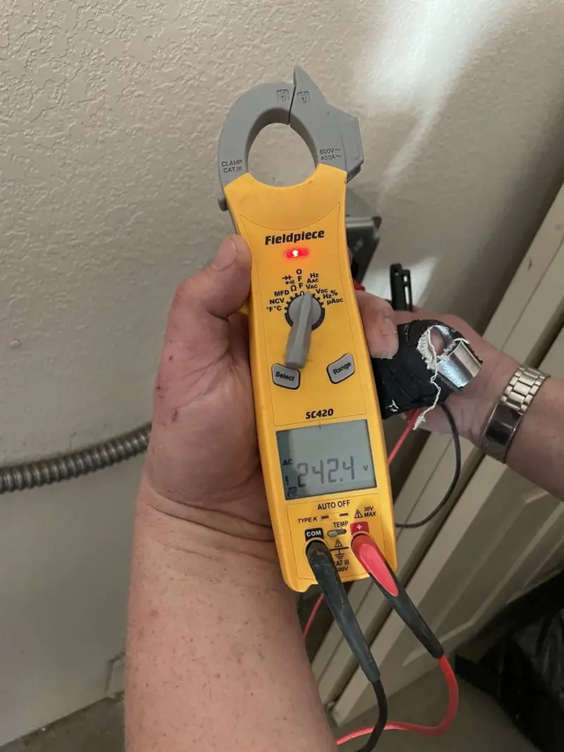 Voltage testing with clamp meter during Generator Installation in Stone Ridge